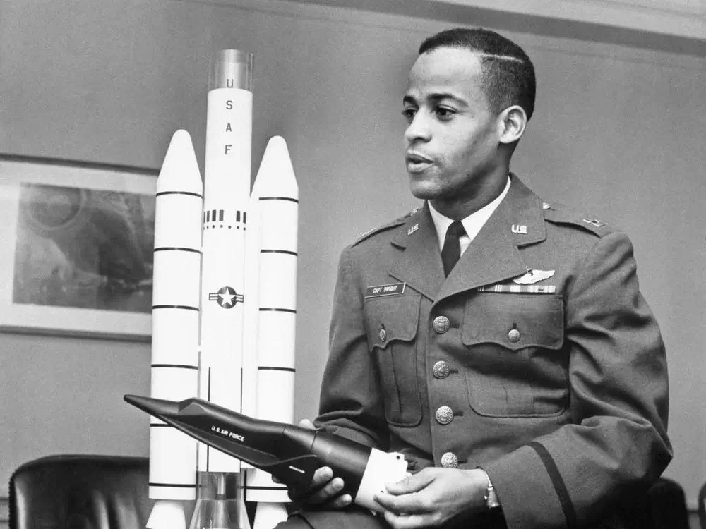 Ed Dwight holding a model of the X-20 Dyna-Soar